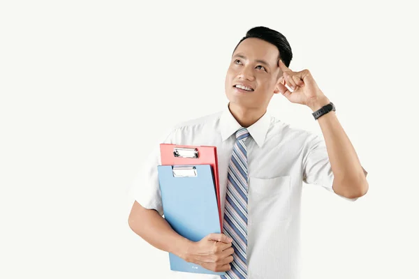 Jonge Aantrekkelijke Aziatische Man Houden Wijsvinger Buurt Van Tempel Glimlachen — Stockfoto