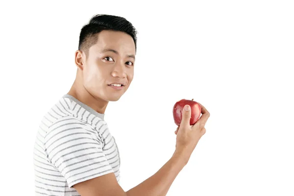 Pas Portrét Mladé Atraktivní Muž Držící Červené Jablko Při Pohledu — Stock fotografie