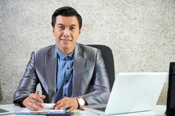 Portrait Smiling Male Leader Suit Sitting His Desk Laptop Signing — Stock Photo, Image