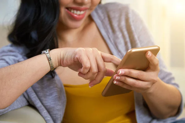 Crop Filipino Lady Cheerfully Smiling Using Modern Smartphone While Relaxing — Stock fotografie