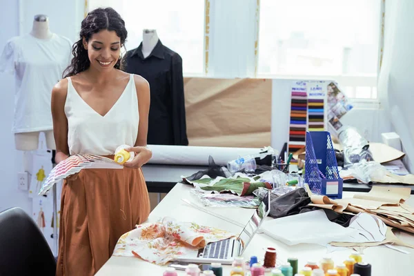 Young Dressmaker Standing Workshop Holding Yellow Thread Searching Same Color — Stock Photo, Image