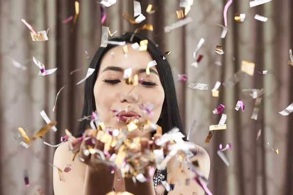Cheerful Young Vietnamese Woman Blowing Out Confetti New Year Party — Stock Photo, Image