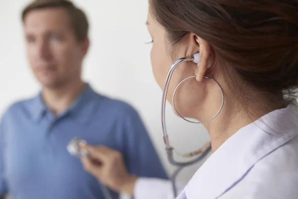 Close Image Female Doctor Using Stethoscope Listening Heartbeat Male Patient — Stock Photo, Image