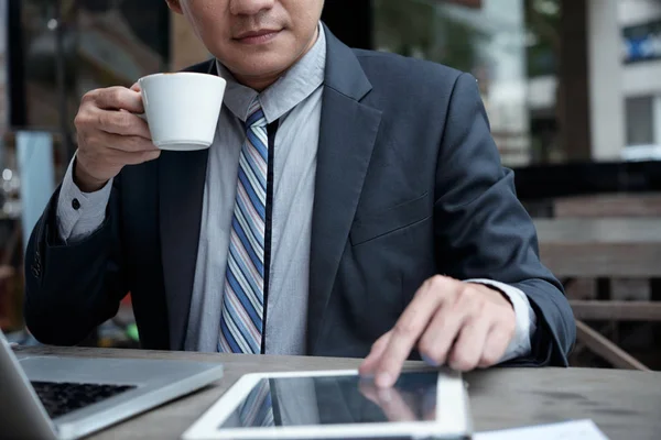 Cropped Image Businessman Holding Morning Coffee Checking Information Tablet Computer — Stock Photo, Image