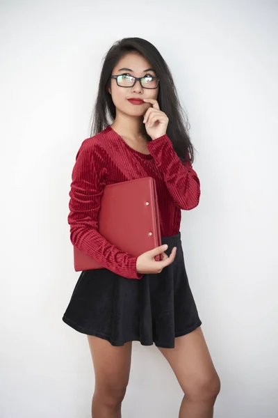 Portrait Pensive Young Secretary Short Skirt Red Blouse Holding Folder — Stock Photo, Image