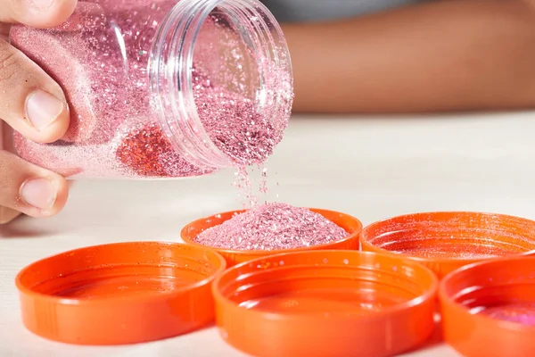 Crop Shot Close Person Pouring Bright Pink Glitters Orange Lid — Stock Photo, Image