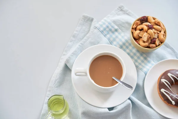 Shot Composed Dessert Glazed Doughnut Bowl Nuts Cup Coffee Table — Stock Photo, Image