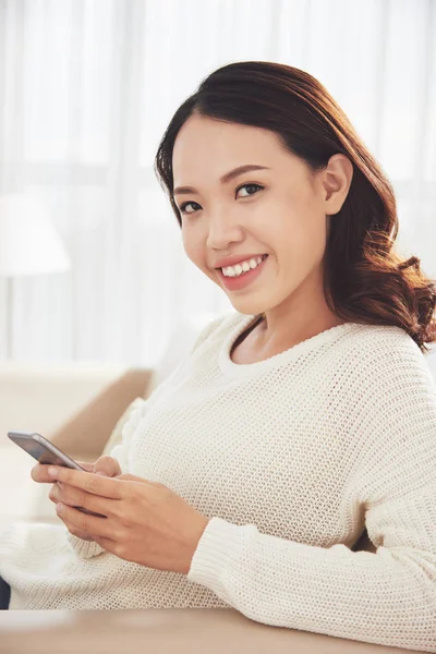 Portrait Attractive Smiling Vietnamese Woman Texting Friends Resting Sofa — Stock Photo, Image