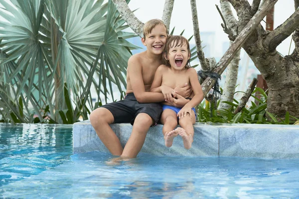 Joyful Boy Tickling His Little Brother Resting Swimming Pool — Stock Photo, Image