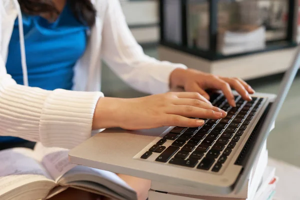 Faceless Shot Schoolgirl Typing Laptop Sitting Books Library Doing Homework — Stock Photo, Image