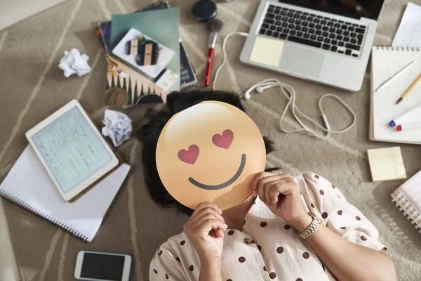 Female Student Lying Floor Covering Paper Face Heart Eyes — Stock Photo, Image