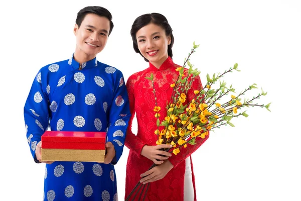 Happy Young Asian Couple Holding Traditional Tet Symbols Blooming Apricot — Stock Photo, Image