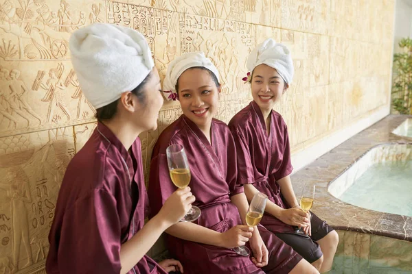 Happy Female Friends Celebrating Champagne Talking Each Other Luxury Spa — Stock Photo, Image