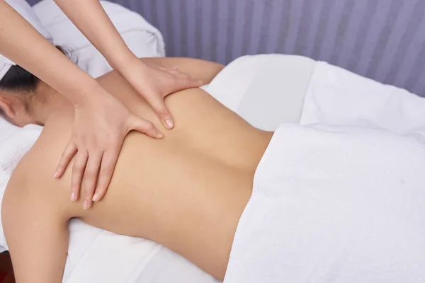 Young Woman Lying Front Her Body While Massage Therapist Massaging — Stock Photo, Image