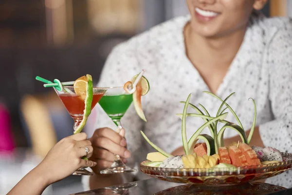 Close Young Couple Holding Colorful Cocktails Decorated Fruits Toasting Restaurant — Stock Photo, Image