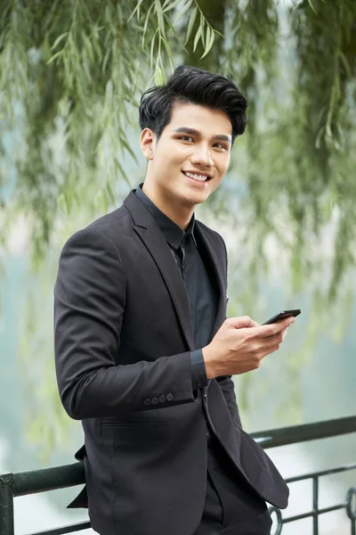 Portrait Handsome Smiling Young Business Executive Smartphone Standing Outdoors — Stock Photo, Image