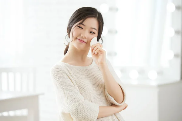 Funny Young Korean Woman Wiping Skin Toner — Stock Photo, Image