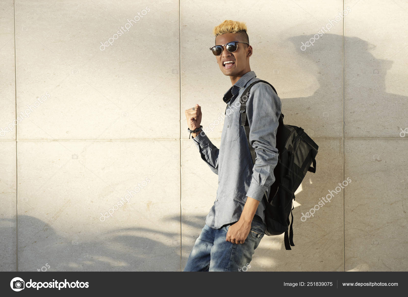 Cheerful Black College Student Sunglasses Celebrating Success