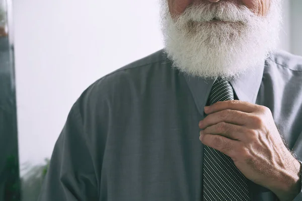 Cropped Image Aged Bearded Entrepreneur Adjusting Necktie — Stock Photo, Image