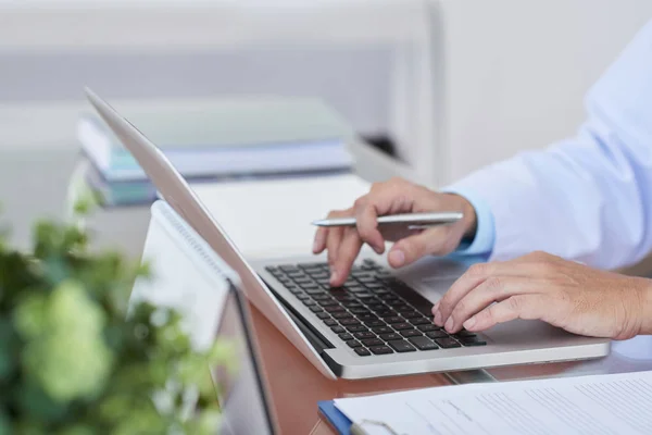 Close Male Doctor Sitting His Workplace Typing Laptop — Stock Photo, Image