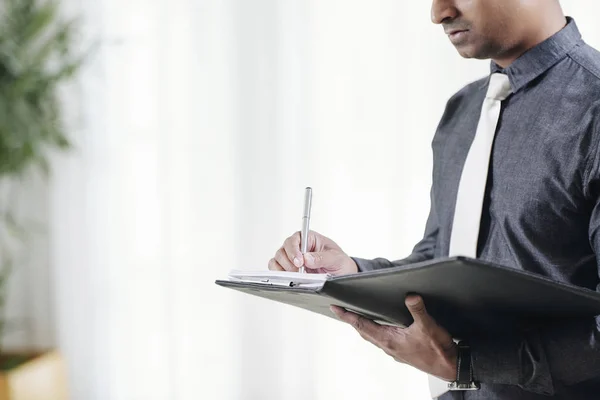 Side View Serious Businessman Inspector Filling Document Big Leather Folder — Stock Photo, Image