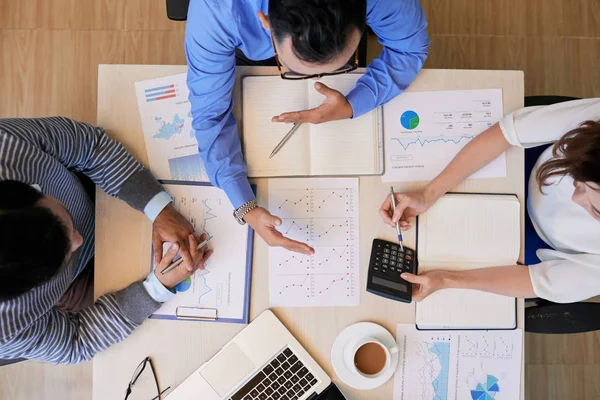 Shot Coworkers Sitting Table Papers Calculating — Stock Photo, Image