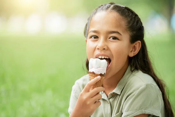 Adorable Asian Girl Eating Yummy Ice Cream Looking Camera While — Stock Photo, Image