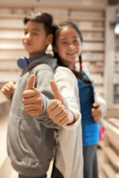 Positive Classmates Standing Back Back Showing Thumbs — Stock Photo, Image