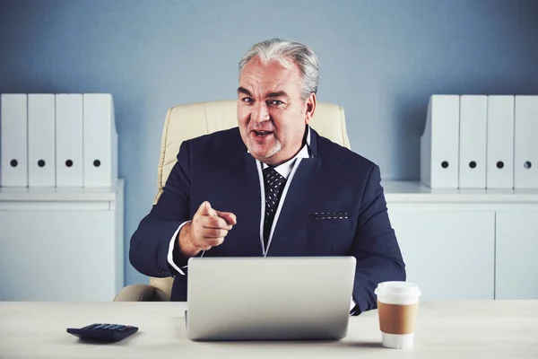 Positive Middle Aged Company Ceo Sitting His Table Pointing Camera — Stock Photo, Image