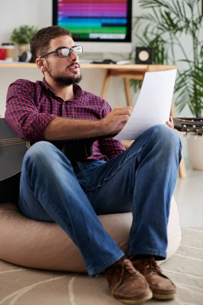 Young Musician Sitting Sofa Guitar Composing Song Writing Paper — Stock Photo, Image