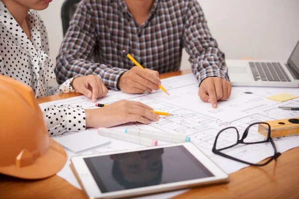 Anonymous Architects Sitting Desk Office Pointing Construction Scheme While Working — Stock Photo, Image