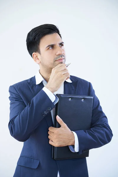Portrait Young Businessman Standing Suit Holding Folder Documents Thinking Something — Stock Photo, Image