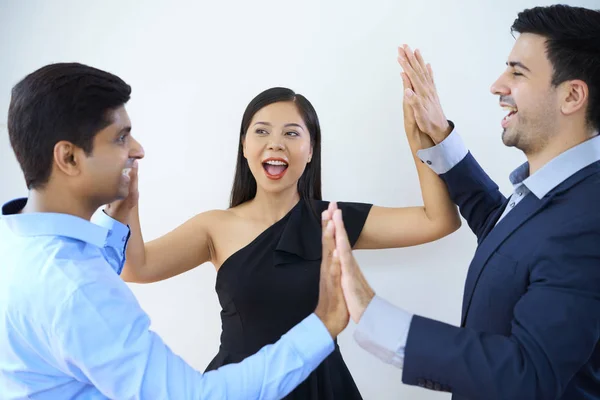 Successful Business Team Standing Holding Hands Smiling Isolated White Background — Stock Photo, Image