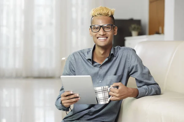 Portrait African Young Man Wearing Eyeglasses Sitting Sofa Cup Coffee — Stock Photo, Image