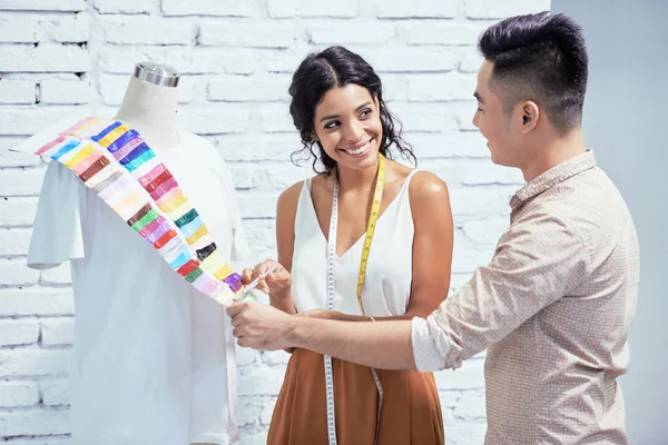Cheerful Tailor Helping Female Fashion Designer Choosing Fabric New Collection — Stock Photo, Image