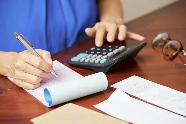 Close Woman Sitting Table Calculating Bills Writing Results Notepad — Stock Photo, Image