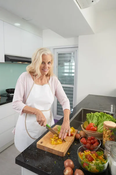 Cheerful Senior Woman Making Salad Lunch — Stock Photo, Image