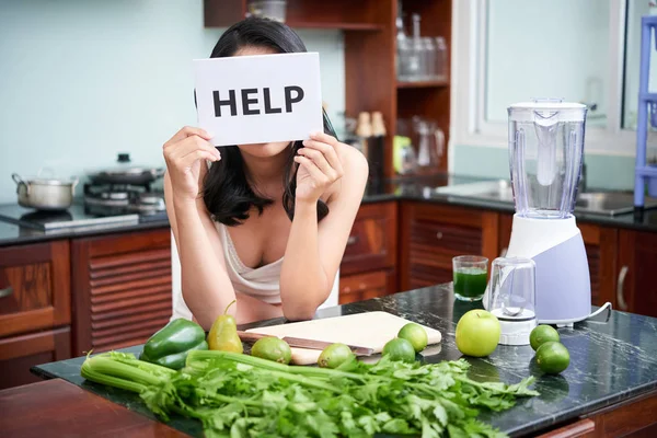 Young Woman Standing Kitchen Table Vegetables Holding Placard Help Text — ストック写真