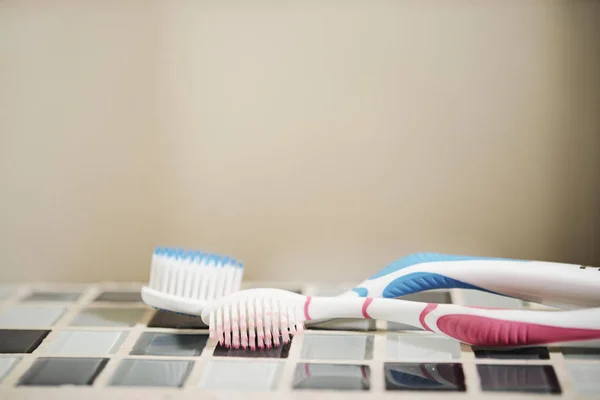 Two Toothbrushes Her Him Lying Table Bathroom Use — Stock Photo, Image
