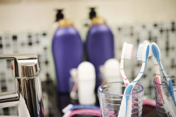 Close Two Toothbrushes Blue Pink Colors Glass Cup Other Toiletries — Stock Photo, Image