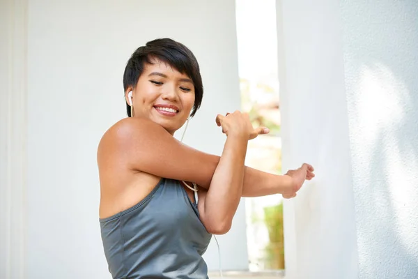 Smiling Beautiful Asian Woman Earphones Enjoying Exercise Arms Stretch — Stock Photo, Image