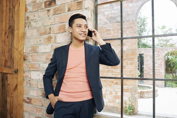 Positive Handsome Entrepreneur Standing Big Window Loft Office Talking Phone — Stock Photo, Image