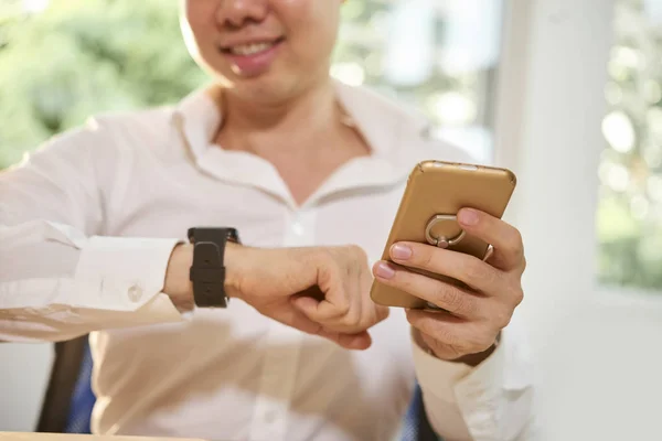 Close Young Manager Looking Time Wristwatch His Hand Holding Mobile — Stock Photo, Image