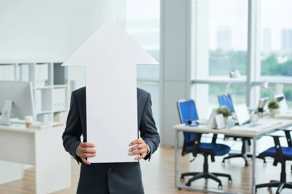Entrepreneur Holding Big Paper Arrow Turned Front His Face — Stock Photo, Image