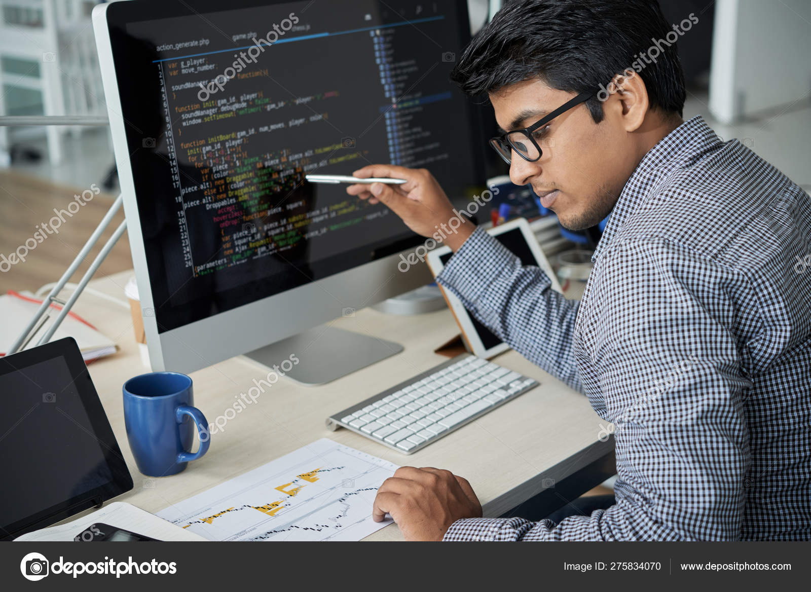 depositphotos_275834070-stock-photo-serious-indian-programmer-eyeglasses-pointing.jpg