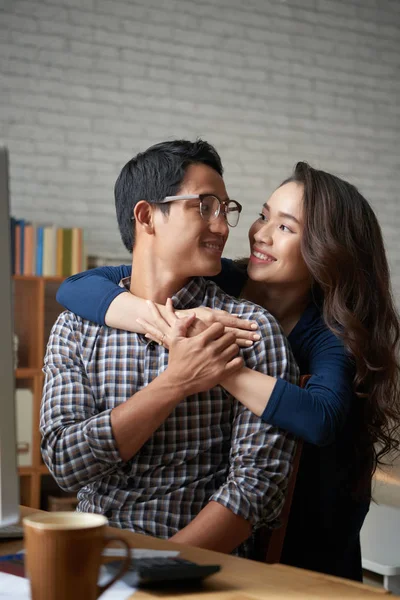 Pretty Young Woman Hugging Her Husband Who Working Home — Stock Photo, Image