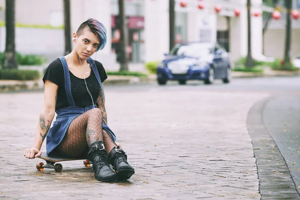 Stylish Young Woman Colorful Hair Sitting Skateboard — Stock Photo, Image