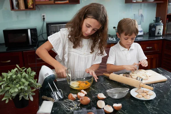 Girl Mixing Milk Eggs Her Brother Kneading Dough — Stock Photo, Image