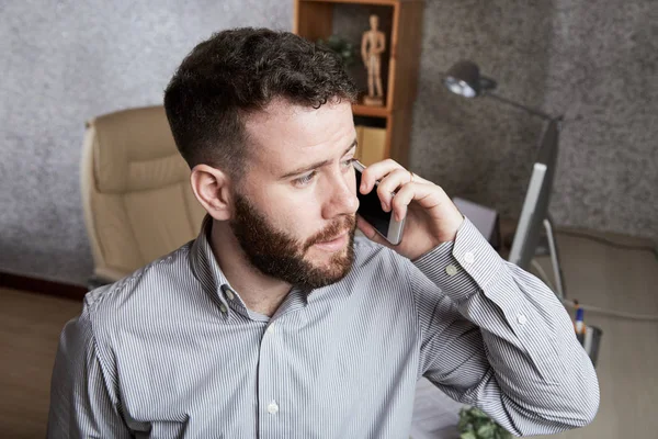 Serious Bearded Businessman Shirt Talking Mobile Phone While Standing Office — Stock Photo, Image