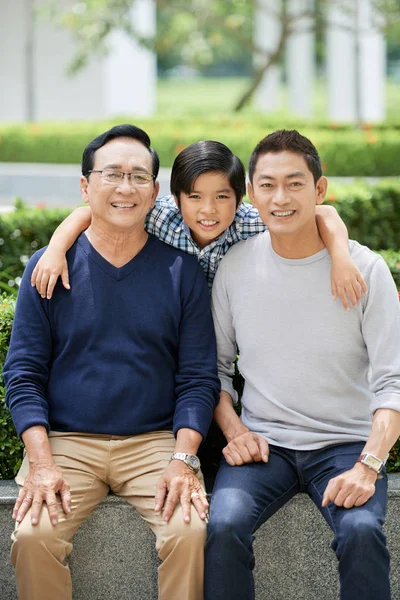 Cute Asian Boy Smiling Looking Camera While Embracing Cheerful Father — Stock Photo, Image